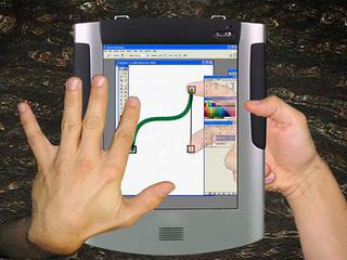 Illustration for article titled Microsoft's LucidTouch Transparent Touchscreen Device Gets All Mocked Up
